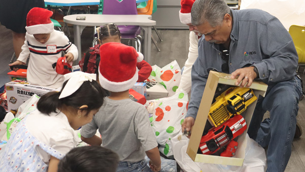 APS employees deliver gifts to WIlson Primary Students