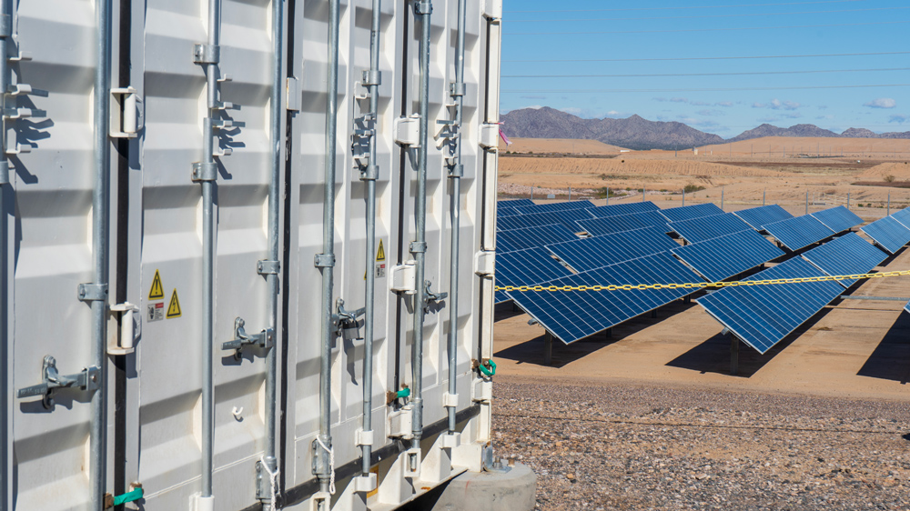 Solar panels near a large commercial batter storage