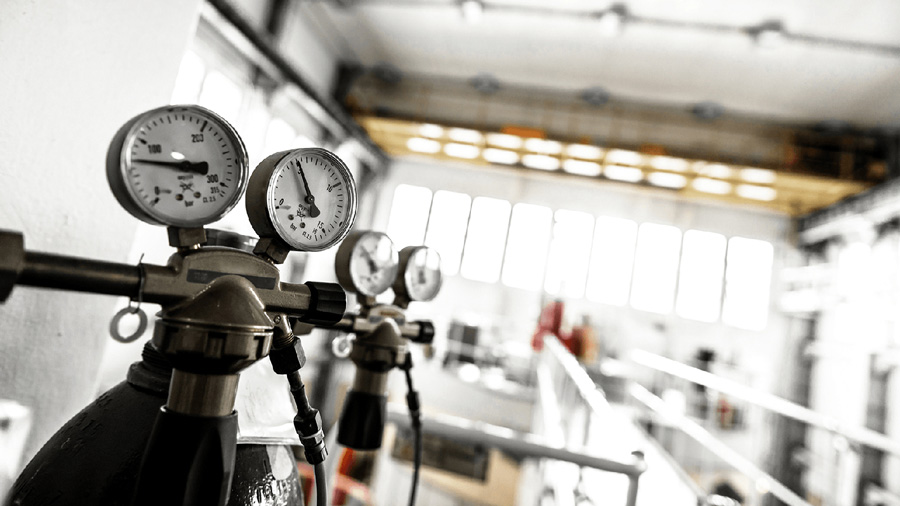 Pressure gauges in a workshop.